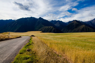 Country road passing through landscape