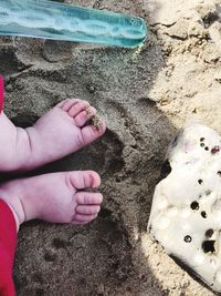 Low section of child on beach