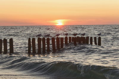 Scenic view of sea against sky during sunset