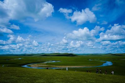 Scenic view of field against sky