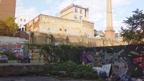 Built structure with plants in foreground