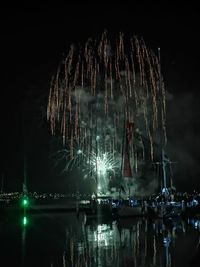 Firework display at night