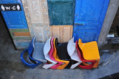 High angle view of multi colored shoes on wall