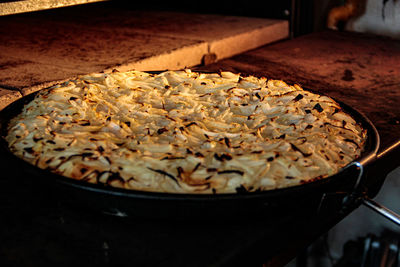 Close-up of meat in cooking pan