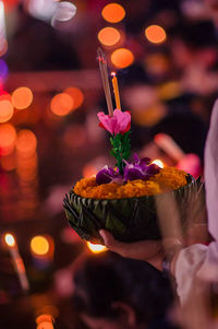 Close-up of woman holding cake