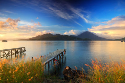 Scenic view of lake against sky during sunset