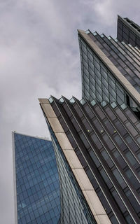 Low angle view of modern buildings against sky