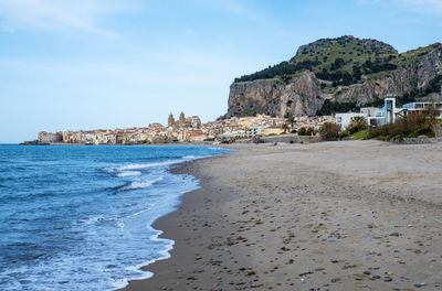Scenic view of beach against sky