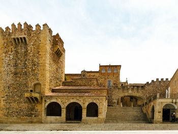 Low angle view of old ruins against sky