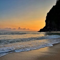 Scenic view of sea against sky during sunset