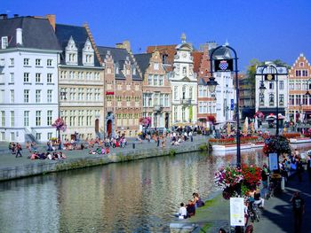 Group of people in front of buildings
