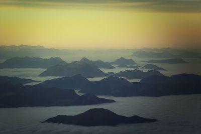 Scenic view of mountains at sunset