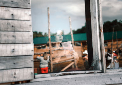 Close-up of construction site seen through window