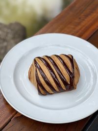 Close-up of chocolate cake in plate on table