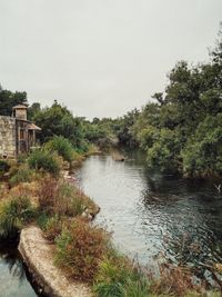 Scenic view of river against sky