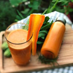 Close-up of orange juice on table