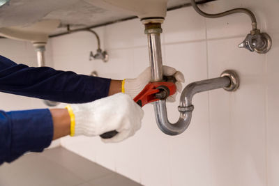 Man working in bathroom