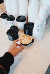 High angle view of coffee cup on table