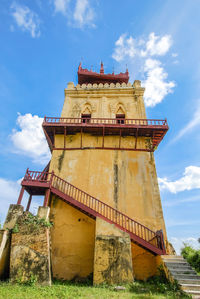 Low angle view of old building against sky