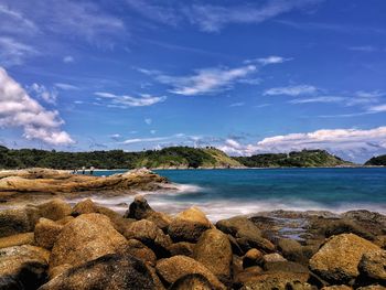 Scenic view of sea against blue sky