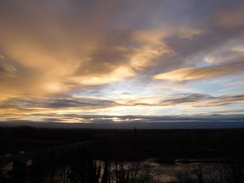 Scenic view of silhouette landscape against sky during sunset