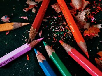 High angle view of multi colored pencils on table