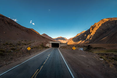 Empty road against sky