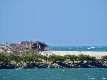 Scenic view of sea against clear sky