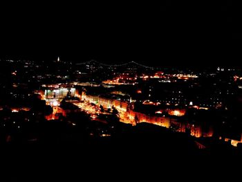 Illuminated cityscape at night