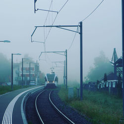 Railroad tracks against sky