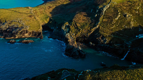 Seascape flying over rocks and bay landscape aerial view of england coral