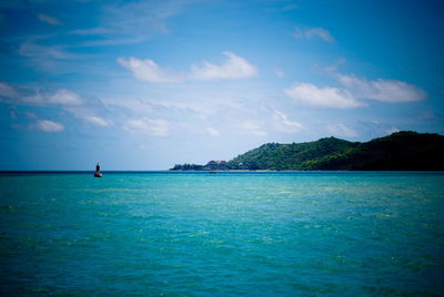 View of sea against blue sky