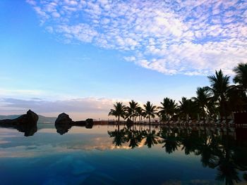 Reflection of clouds in calm lake