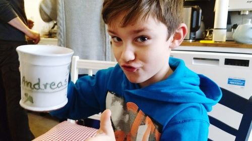 Close-up of boy with drink