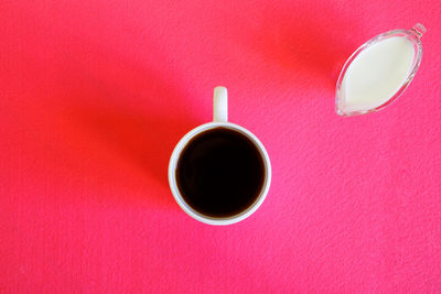 Directly above shot of coffee cup on table