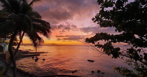 Scenic view of sea against sky at sunset