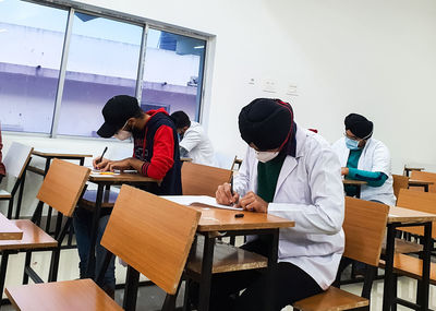 Group of people working on table