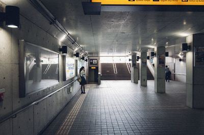Man waiting at subway station