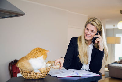 Portrait of woman working at home