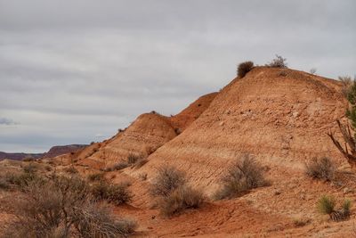 Rock formations in desert against sky