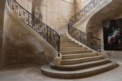 Low angle view of spiral staircase in building