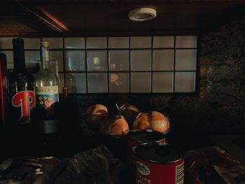 View of wine bottles on table at home