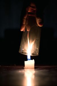 Close-up of lit candle