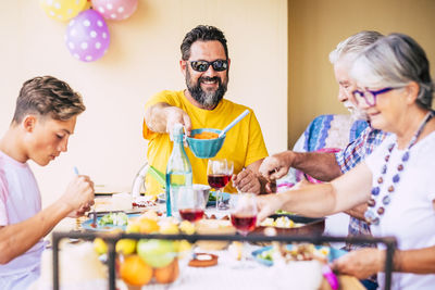 Friends sitting on table