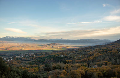 Scenic view of landscape against sky during sunset