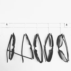 Close-up of shoes over white background