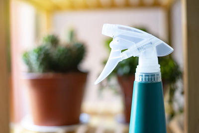 Close-up of green bottle on table