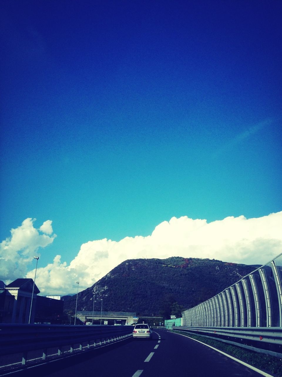 transportation, road, the way forward, blue, mountain, road marking, diminishing perspective, sky, highway, vanishing point, mountain range, copy space, country road, clear sky, nature, landscape, car, long, empty, scenics