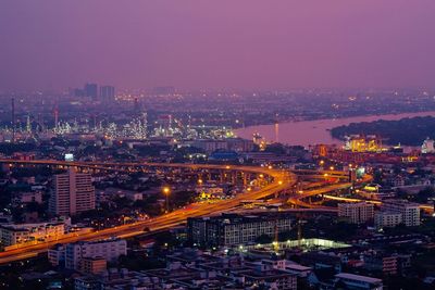 High angle view of illuminated buildings at night