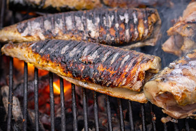 Close-up of meat on barbecue grill